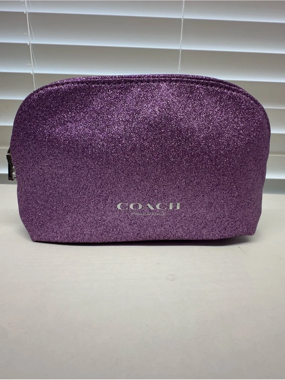 Coach Cosmetic Pouch in Cream with Orange Stripes with purple Glitter pouch